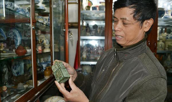 Một ấn tín ông Tĩnh mua ở cửa hàng lưu niệm giống với loại người dân đào được.