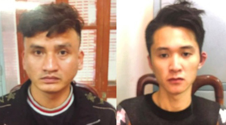 Hải và Hiệp tại cơ quan điều tra. Ảnh: H.T.