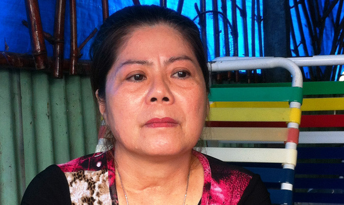 Bà Phạm Thị Lắm vừa tỉnh lại khi nhìn thấy nhiều cán bộ xuất hiện tại tòa.