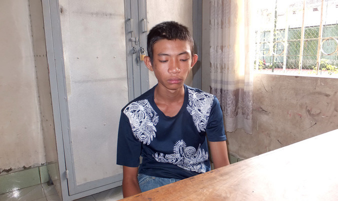 Nguyễn Tấn Đức tại cơ quan công an.