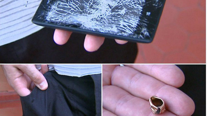 Viên đạn của tên cướp đã bị chiếc Lumia 520 đẩy lệch đường bay. Màn hình của thiết bị này cũng nứt nẻ nghiêm trọng. Ảnh: Globo.
