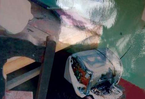 Các vật dụng, tài liệu hư hỏng, thiệt hại sau khi bị Vi Văn Xăm đốt. Ảnh: Công an nhân dân.