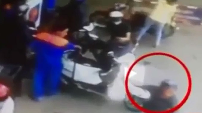 Bị cướp nửa tỷ đồng khi đang... đổ xăng