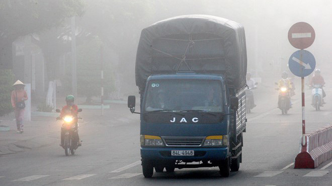 Sương mù dày đặc ở Vĩnh Long. Ảnh: TTXVN