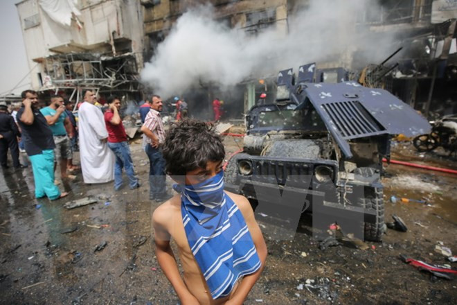 Hiện trường một vụ đánh bom ở Baghdad. (Nguồn: AFP/TTXVN)