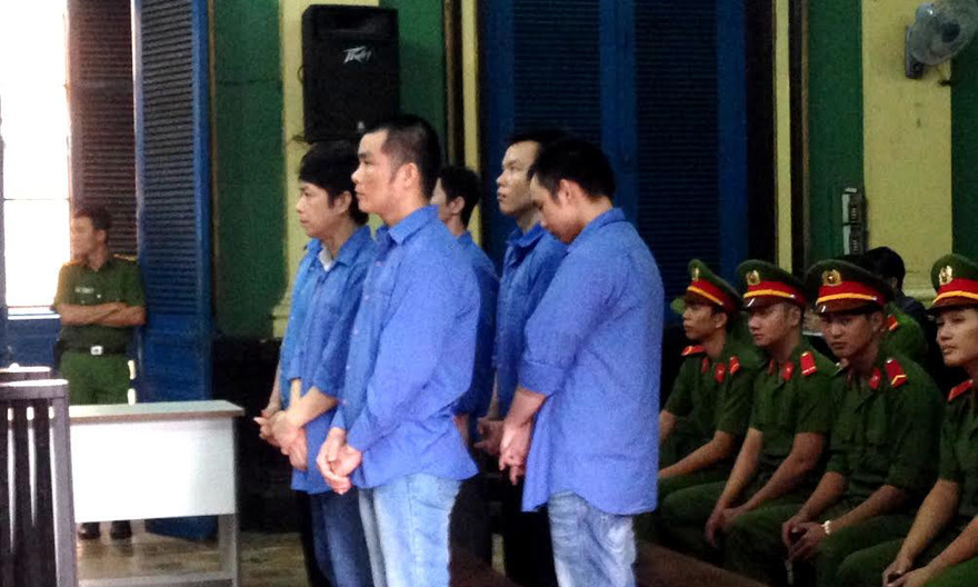 Băng nhóm ‘Tý điên’ tại phiên tòa sáng nay 29/9. Ảnh: Tân Châu