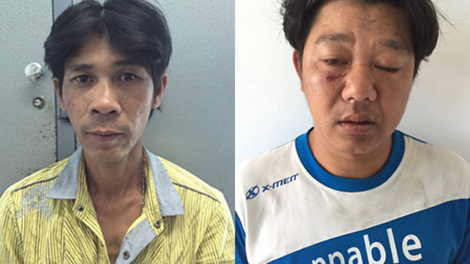 Hai tên cướp tại cơ quan điều tra. Ảnh: Q.T.