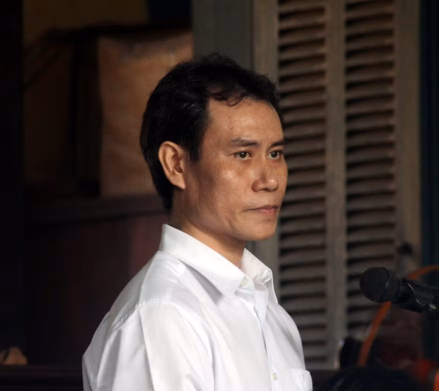 Nguyên thiếu úy công an – bị cáo Lê Hoàng Quân tại phiên tòa sáng 13/7. Ảnh: Tân Châu