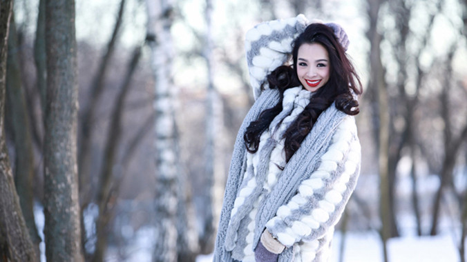 Thúy Hằng chụp hình giữa trời tuyết âm 17 độ