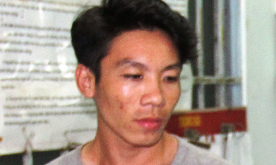 Khưu Văn Minh tại cơ quan điều tra.