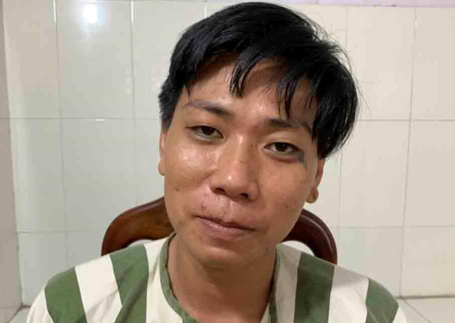 Minh tại cơ quan điều tra. Ảnh: Công an cung cấp