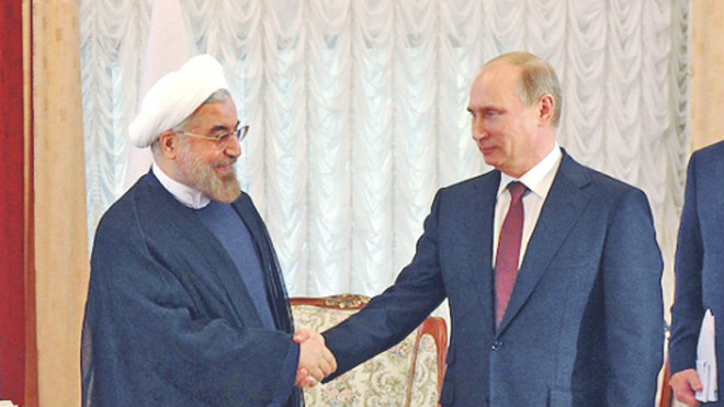 Tổng thống Nga Putin (phải) và Tổng thống Iran Rouhani