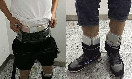 Hàng trăm chiếc iPhone 7 được quấn quanh người để nhập lậu vào Trung Quốc.