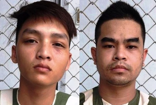 Quyết (trái) và Thành tại cơ quan điều tra