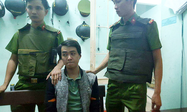 Nghi phạm Hoàng bình thản khi bị công an bắt giữ