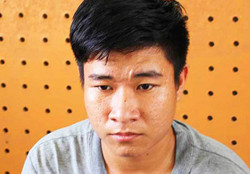 Nghi can bị bắt giữ. Ảnh: CA