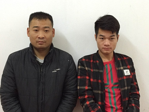 Bình và Hiệp tại cơ quan công an. Ảnh: C.A