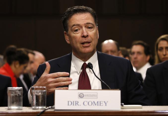 Ông James Comey cung cấp lời khai trước Ủy ban Tình báo Thượng viện. Ảnh: Reuters
