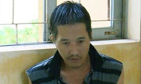 Lê Quốc Sử tại cơ quan công an.