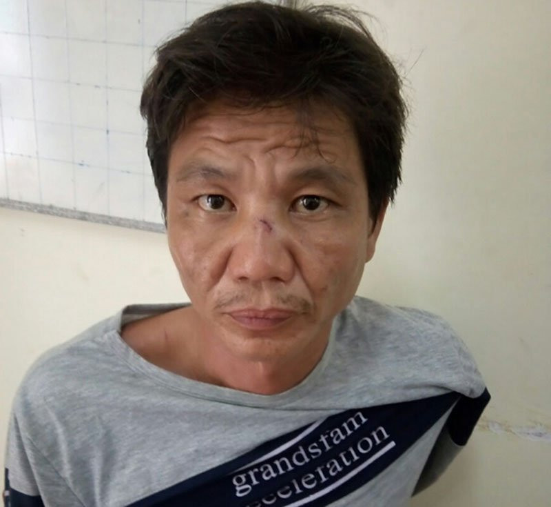 Lê Văn Tấn tại cơ quan điều tra. Ảnh: Công an cung cấp