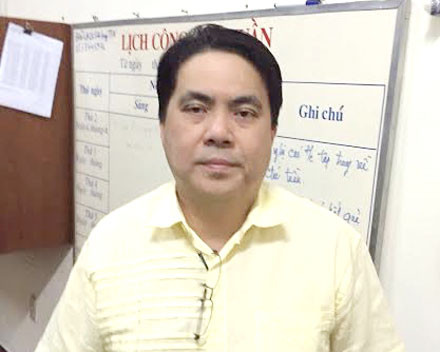 Nghi can Ngu Weng Hie bị công an bắt, nghi là chủ mưu trong đường dây. Ảnh CA cung cấp.