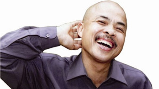 NSƯT Hán Văn Tình luôn được khán giả nhớ đến với nụ cười "Chu Văn Quềnh"