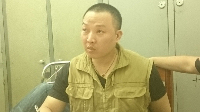 Đối tượng Dương tại cơ quan điều tra. Ảnh: Tuấn Nguyễn