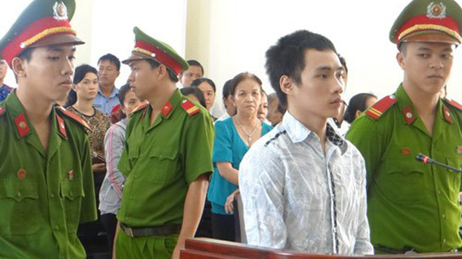 Lò Văn Phóng tại phiên tòa xét xử ở Bình Dương - Ảnh: Đỗ Trường