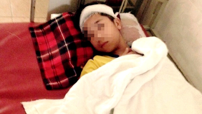 Em Hồ Xuân Hóa đang được điều trị tại BV Phủ Diễn, Diễn Châu.