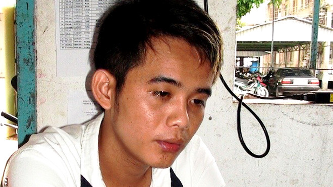 Huỳnh Hoài Hận tại cơ quan công an. Ảnh: Minh Anh