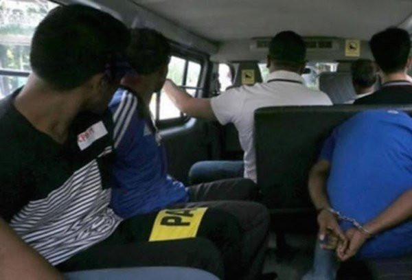 Cảnh sát Singapore bắt giữ các nhân vật tham gia dàn xếp tỷ số. Ảnh: Jakarta Post.