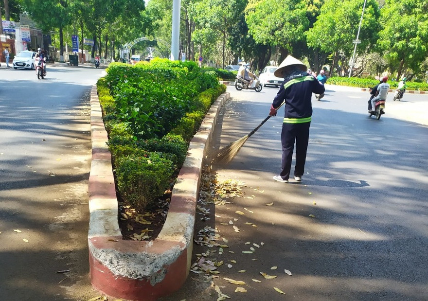 Công nhân môi trường quét rác