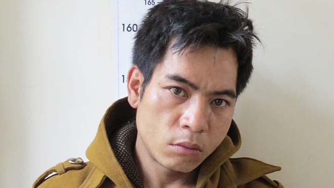 Đối tượng Ghền tại cơ quan điều tra. Ảnh: T. Duyên