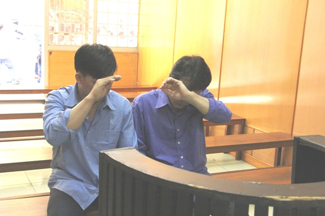 Hai anh em Phụng, Sơn tại tòa ngày 19/7. Ảnh: Tân Châu