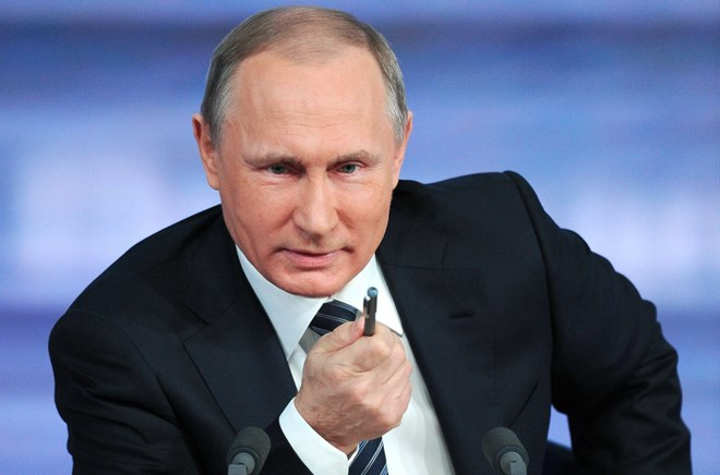 Tổng thống Nga Vladimir Putin trả lời phỏng vấn tại cuộc họp báo. (Nguồn: AFP)