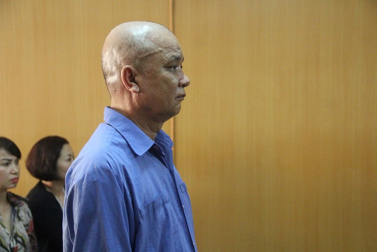 Huỳnh Văn Tuông tại tòa. Ảnh: Tân Châu