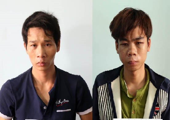 Hai nghi can cướp tài sản tại cơ quan điều tra. Ảnh: Zing