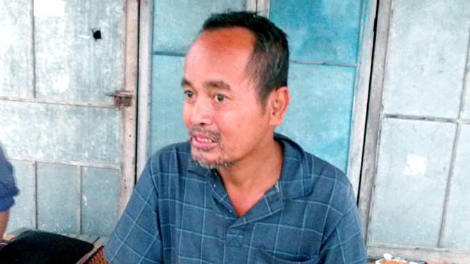 Người đàn ông đi lạc được người dân cưu mang. Ảnh: Nguyễn Trang.