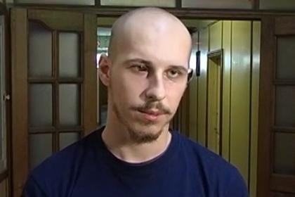 Chỉ huy trưởng quân đoàn tự vệ Azov, ông Vadim Kravchenko, bị đối thủ cắn đứt tai sau phiên họp hội đồng thành phố Kherson của Ukraine ngày 18/12. Ảnh: Rushingcrash.