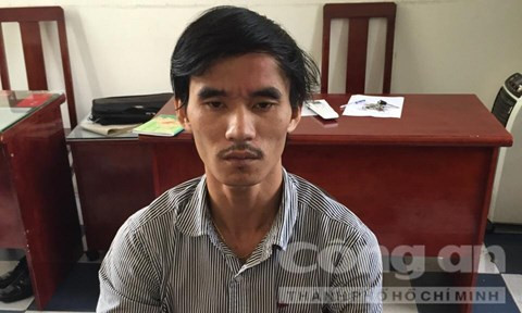 Đối tượng Lê Phạm Trung Thông tại cơ quan công an - Ảnh: Thiên Long