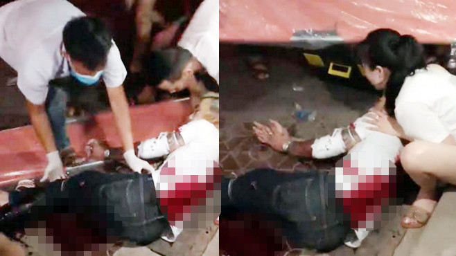 Nam thanh niên được các nhân viên y tế cấp cứu tại hiện trường