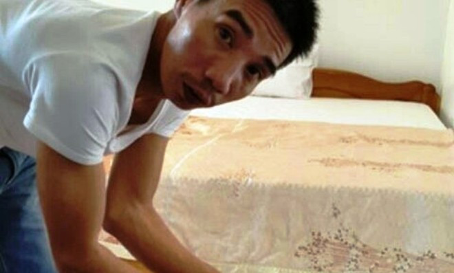 Đối tượng Võ Đại Việt bị công an bắt tại khách sạn. Ảnh: T.Bình