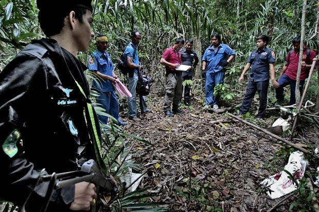 Cảnh sát phát hiện một hố chôn người hồi tháng 5. Ảnh: The Times.