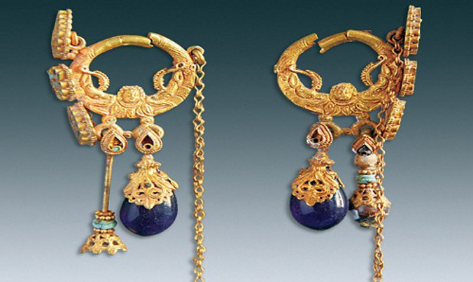 Đôi khuyên tai tinh xảo của chủ nhân ngôi mộ. Ảnh: Di chỉ Văn hóa Trung Quốc.