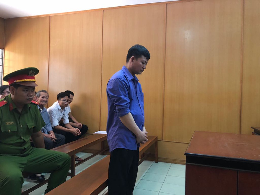 Nguyễn Văn Nghĩa tại tòa sáng nay. Ảnh: Tân Châu