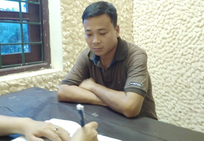 Bị can Dũng tại cơ quan công an