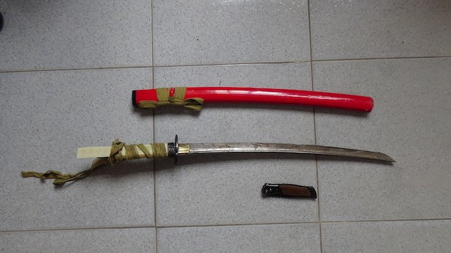 Hung khí gây án bị thu giữ. Ảnh: Công an nhân dân