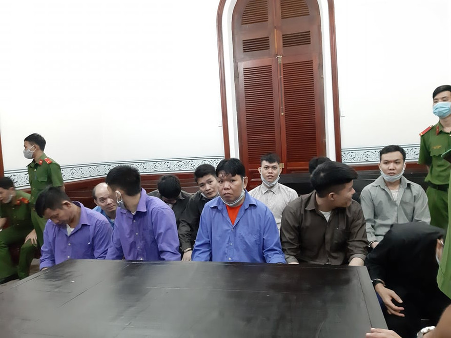 Các bị cáo tại phiên tòa ngày 14/9. Ảnh: T.M