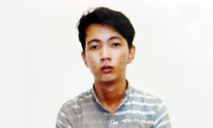 Tuân tại cơ quan điều tra. Ảnh: C.A