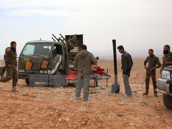 Binh sỹ Syria tại làng Jihar sau chiến dịch truy quét ngày 8/3. Nguồn: AFP/TTXVN